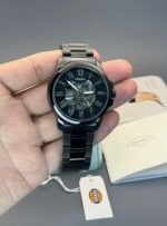 Fossil First Copy Modern Machine watch – black case, automatic movement.