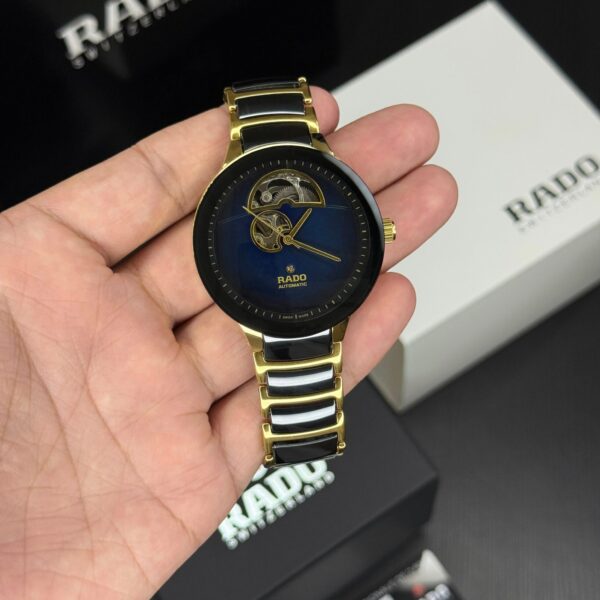 Rado Centrix Open Heart first copy men’s watch – 43MM, purple dial, two-tone ceramic bracelet, automatic.