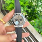 Showcasing Rolex Daytona Oysterflex Grey First Copy Watch with man holding in hand