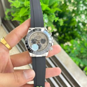 Showcasing Rolex Daytona Oysterflex Grey First Copy Watch with man holding in hand