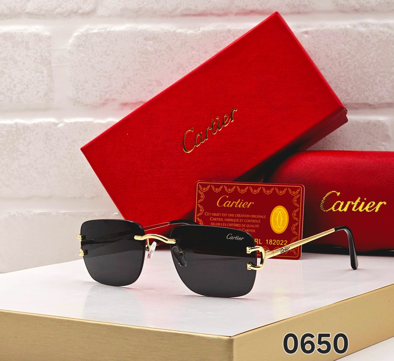Cartier-0650-Rectangular-Rimless-Sunglasses-Black-Gold-1 Cartier 0650 Rectangular Rimless Sunglasses Black & Gold - Image 1