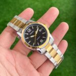 Fossil Heritage 2023 Gold-Black Analog 7AA
