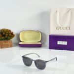 Gucci 2004 Transparent Gray Round Sunglasses