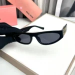 Miu Miu Cat Eye Black Sunglasses Women UV Protection - Image 2