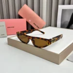 Miu Miu Cat Eye Brown Print Sunglasses - One Size