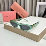 Miu Miu Cat Eye Green-Black Sunglasses One Size