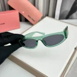 Miu Miu Cat Eye Green-Black Sunglasses One Size - Image 2