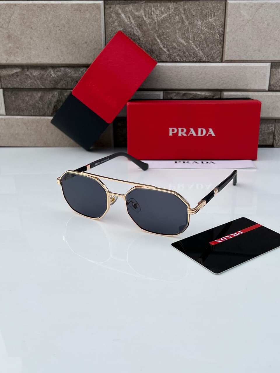 Prada-Geometric-Sunglasses-Gold-Frame-Dark-Grey-Lenses-1 Prada Geometric Sunglasses Gold Frame Dark Grey Lenses - Image 1