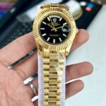 Rolex Day-Date 40 Evergreen Gold Black Dial 7AA